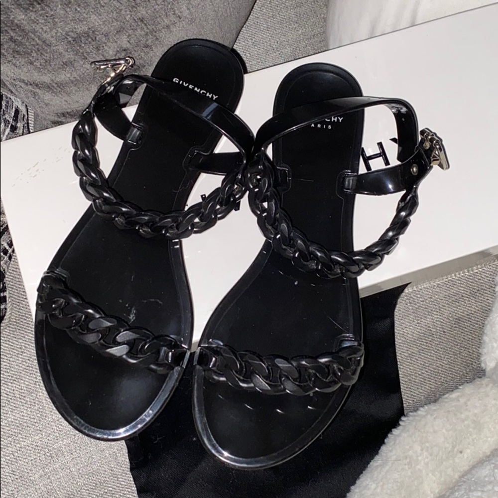 Black Givenchy chain sandals.